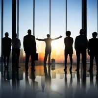 Silhouettes of Business People in Office Building